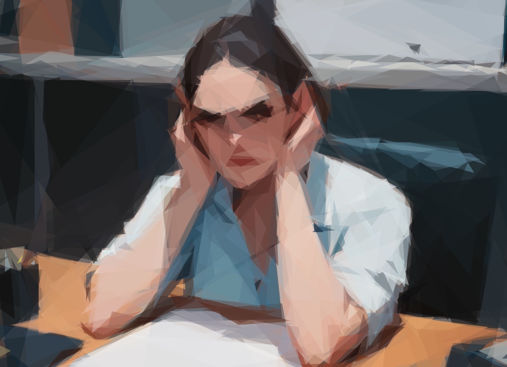 Woman plugging her ears